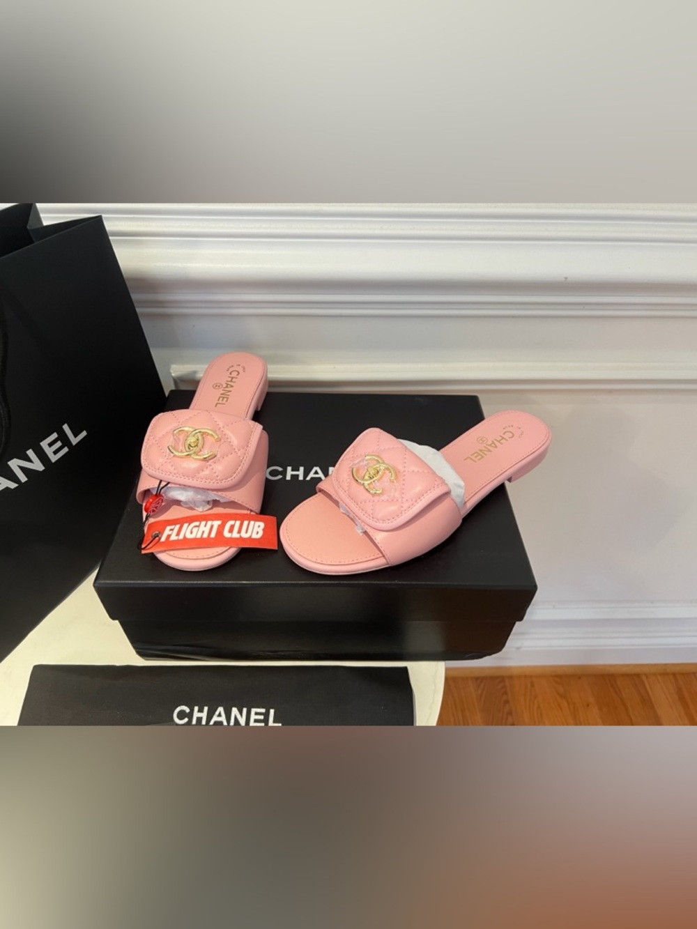 CHANEL Pink Quilted Slide Mules with Gold CC Turnlock Emblem